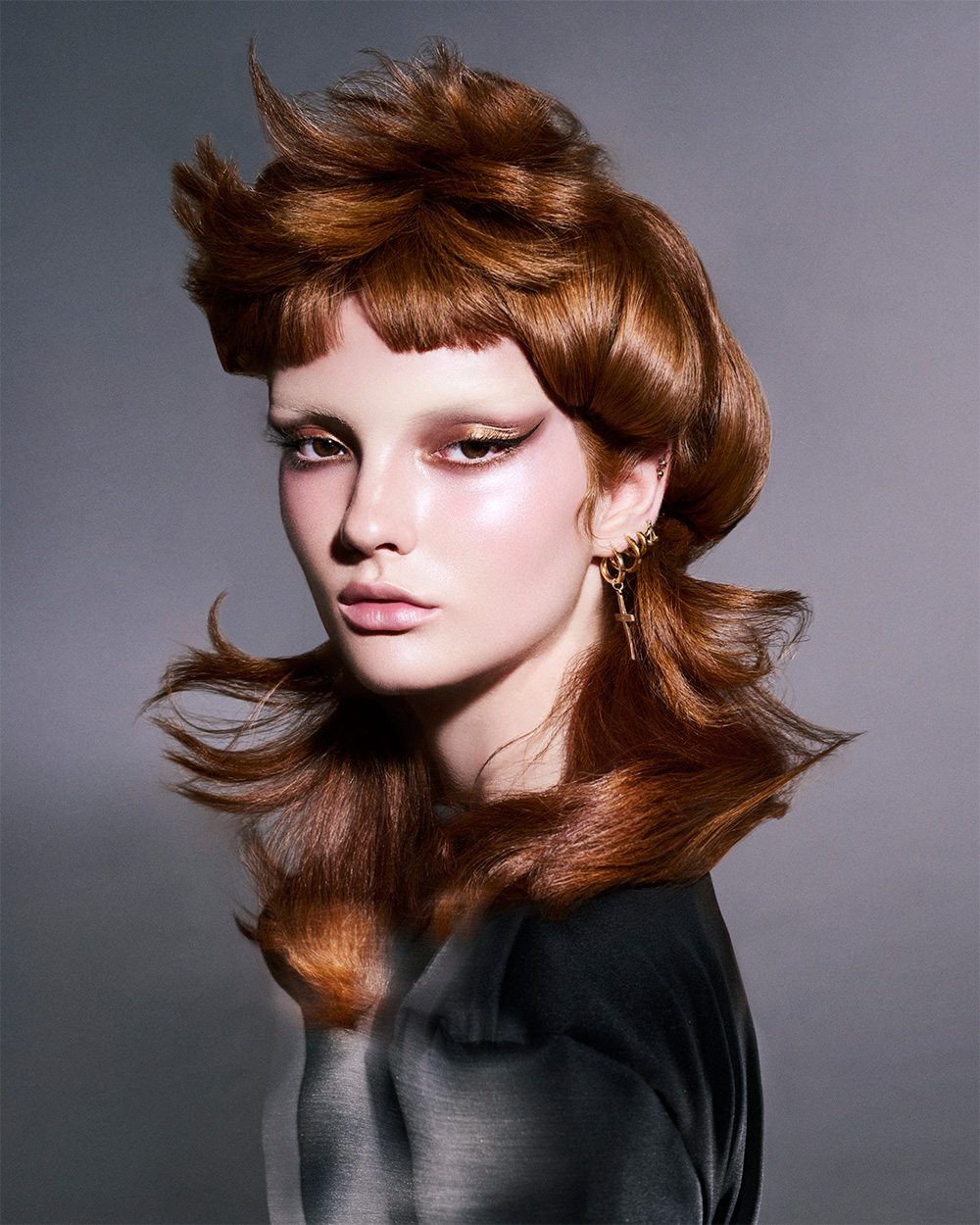 Daniele De Angelis - BHA London Hairdresser of the Year 2025 -  Coppery-Brown Hairstyle with a Distinct Fringe and Choppy Layers